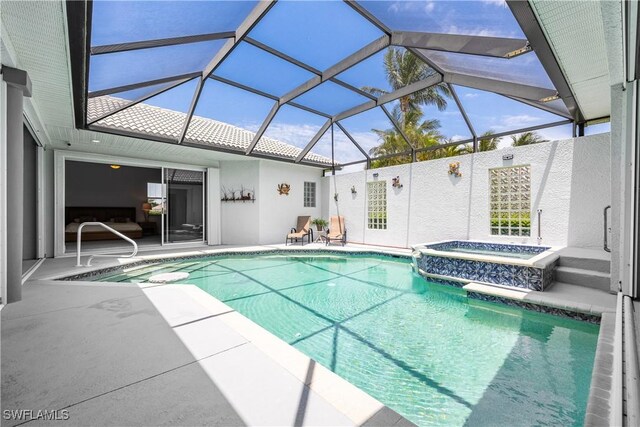 4081 Marianne Key Rd, Punta Gorda, FL 33955 - view of pool with a patio, a pool with connected hot tub, and glass enclosure