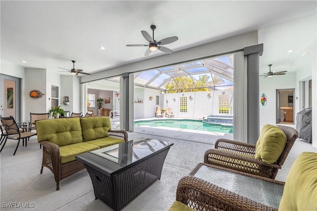 4081 Marianne Key Rd, Punta Gorda, FL 33955 - view of patio with ceiling fan, an outdoor hangout area, a pool with connected hot tub, and glass enclosure