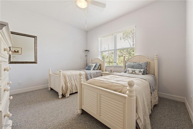 4081 Marianne Key Rd, Punta Gorda, FL 33955 - carpeted bedroom with baseboards and ceiling fan