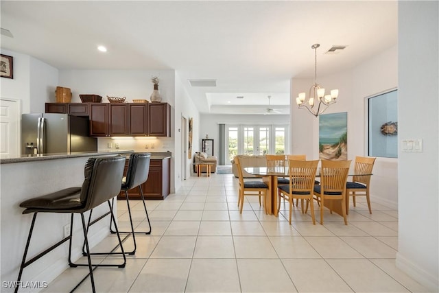 4081 Marianne Key Rd, Punta Gorda, FL 33955 - dining space featuring a chandelier, light tile patterned flooring, recessed lighting, and baseboards