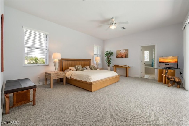 4081 Marianne Key Rd, Punta Gorda, FL 33955 - bedroom with multiple windows, light colored carpet, and baseboards