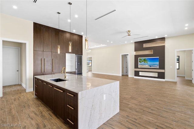 3413 NW 9th Ter, Cape Coral, FL 33993 - kitchen featuring modern cabinets, a sink, a ceiling fan, recessed lighting, and an island with sink