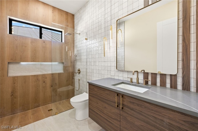 3413 NW 9th Ter, Cape Coral, FL 33993 - full bath with tile walls, toilet, tiled shower, vanity, and tile patterned floors