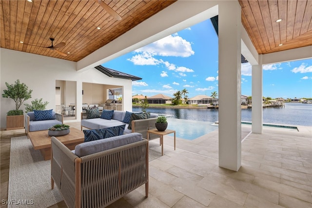 3413 NW 9th Ter, Cape Coral, FL 33993 - view of patio / terrace with area for grilling, a water view, a ceiling fan, and outdoor lounge area