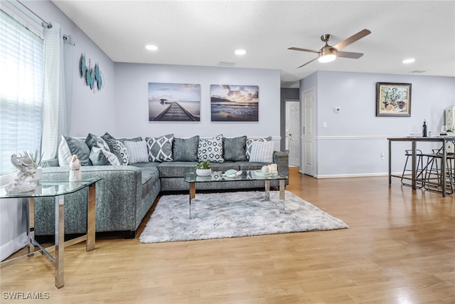2809 50th St SW, Naples, FL 34116 - living room with ceiling fan, plenty of natural light, wood finished floors, and recessed lighting