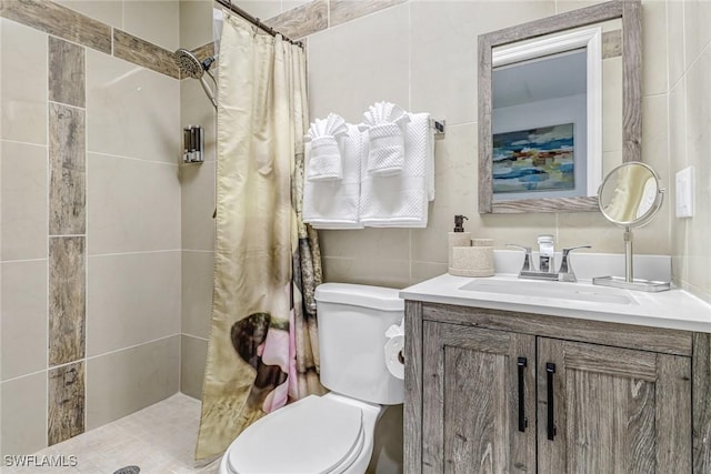 2809 50th St SW, Naples, FL 34116 - full bath featuring toilet, tile walls, a tile shower, and vanity