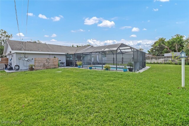2809 50th St SW, Naples, FL 34116 - view of yard featuring glass enclosure