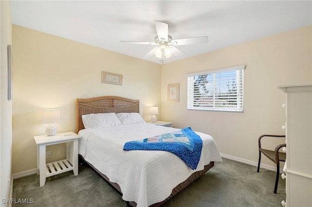 carpeted bedroom featuring baseboards and ceiling fan