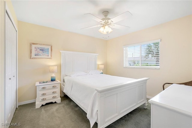 bedroom with carpet floors, a closet, baseboards, and a ceiling fan