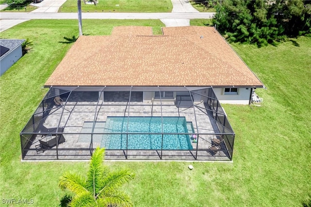 view from above of property featuring a pool area