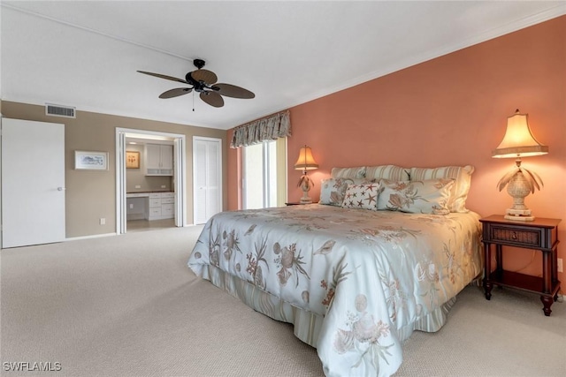 3399 Gulf Shore Blvd N Unit 303, Naples, FL 34103 - carpeted bedroom with ceiling fan, connected bathroom, ornamental molding, and baseboards