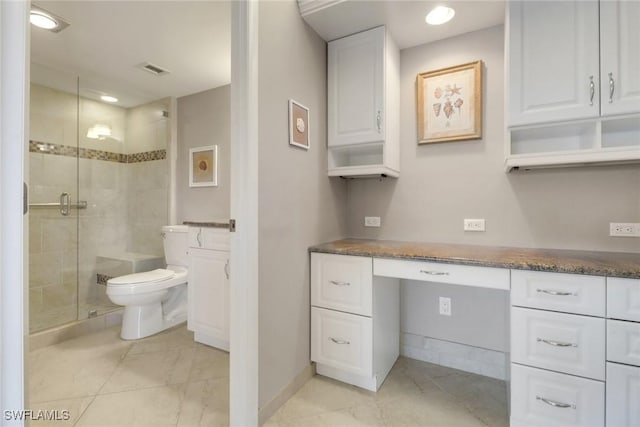 3399 Gulf Shore Blvd N Unit 303, Naples, FL 34103 - bathroom with tile patterned floors, toilet, a shower stall, vanity, and recessed lighting