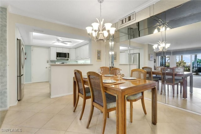 3399 Gulf Shore Blvd N Unit 303, Naples, FL 34103 - dining room featuring a chandelier, light tile patterned floors, ornamental molding, a raised ceiling, and baseboards
