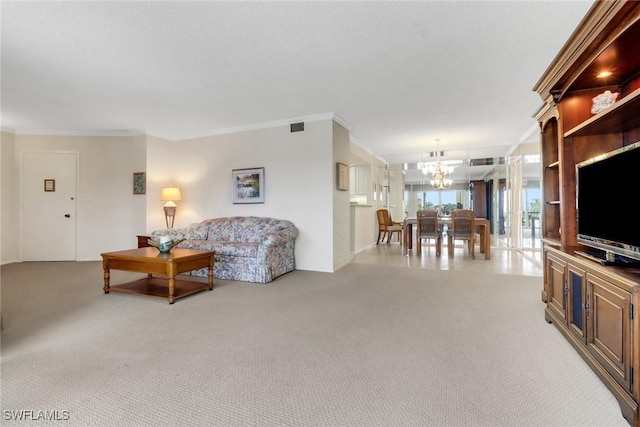 3399 Gulf Shore Blvd N Unit 303, Naples, FL 34103 - living area with light carpet, a chandelier, and crown molding