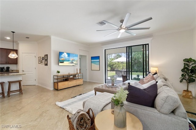 9519 Foxglove Ln, Naples, FL 34120 - living area featuring crown molding, ceiling fan, baseboards, and light tile patterned flooring