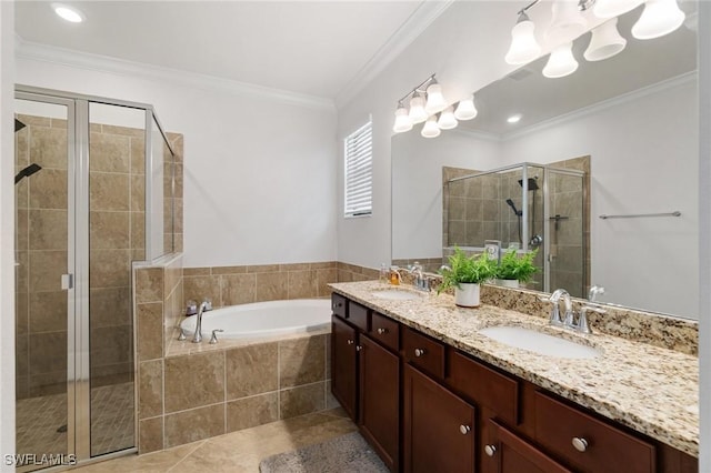 9519 Foxglove Ln, Naples, FL 34120 - bathroom with a garden tub, a stall shower, double vanity, tile patterned floors, and crown molding