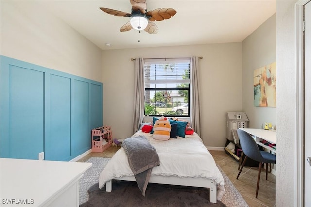 9519 Foxglove Ln, Naples, FL 34120 - bedroom featuring light tile patterned flooring and ceiling fan