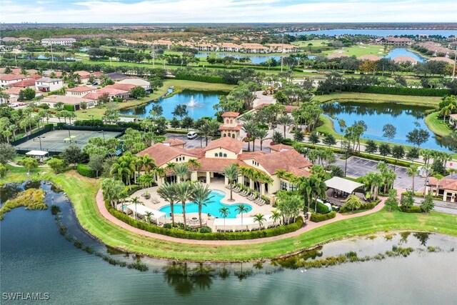 9519 Foxglove Ln, Naples, FL 34120 - aerial perspective of suburban area with a pool and a large body of water