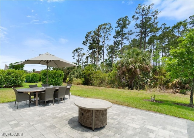 9519 Foxglove Ln, Naples, FL 34120 - view of patio featuring outdoor dining space