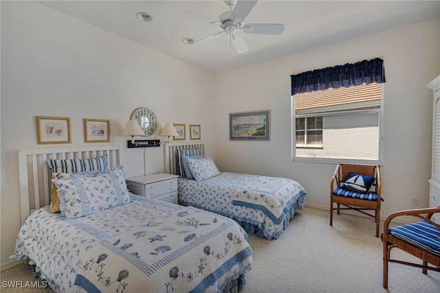 25224 Pelican Creek Cir Unit 203, Bonita Springs, FL 34134 - bedroom with light colored carpet, baseboards, and ceiling fan