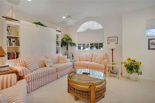 25224 Pelican Creek Cir Unit 203, Bonita Springs, FL 34134 - living room with carpet floors and vaulted ceiling