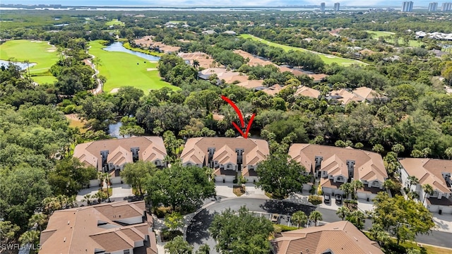 25224 Pelican Creek Cir Unit 203, Bonita Springs, FL 34134 - aerial view of residential area featuring a nearby body of water and a golf club