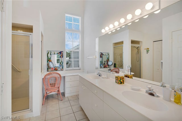 25224 Pelican Creek Cir Unit 203, Bonita Springs, FL 34134 - bathroom with a shower stall, tile patterned floors, and double vanity
