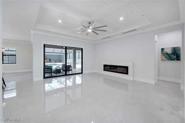 333 12th Ave NE, Naples, FL 34120 - unfurnished living room with a ceiling fan, baseboards, a glass covered fireplace, tile patterned flooring, and crown molding