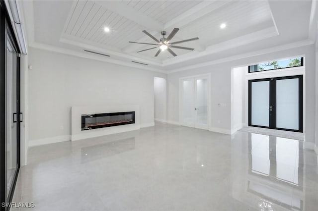 333 12th Ave NE, Naples, FL 34120 - unfurnished living room featuring a raised ceiling, a glass covered fireplace, baseboards, a ceiling fan, and recessed lighting