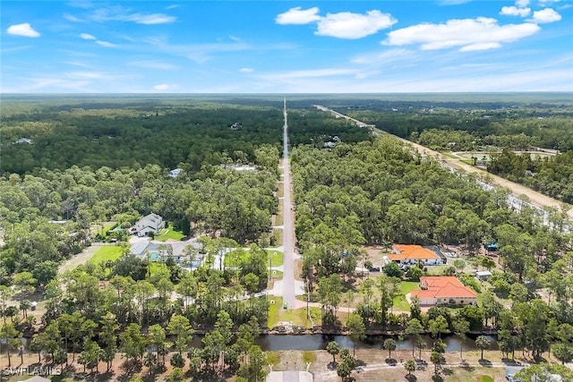 333 12th Ave NE, Naples, FL 34120 - aerial overview of property's location featuring a heavily wooded area