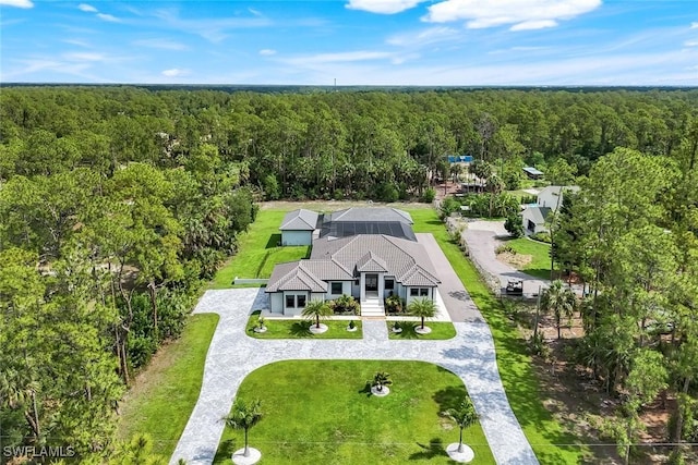 333 12th Ave NE, Naples, FL 34120 - view from above of property with a heavily wooded area