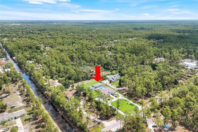 333 12th Ave NE, Naples, FL 34120 - drone / aerial view of a heavily wooded area