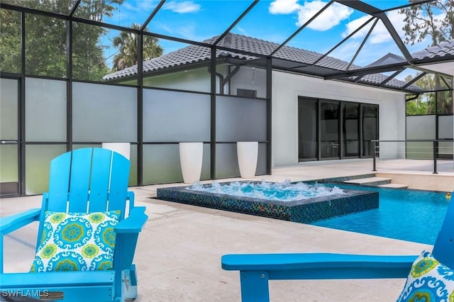333 12th Ave NE, Naples, FL 34120 - outdoor pool featuring an in-ground hot tub, a patio, and glass enclosure