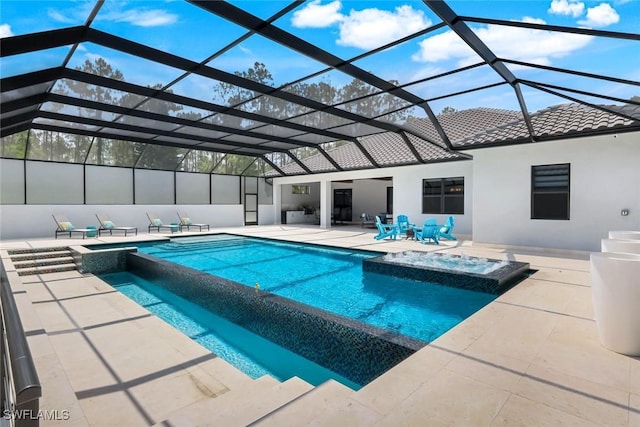 333 12th Ave NE, Naples, FL 34120 - view of swimming pool featuring a pool with connected hot tub, a patio, and glass enclosure