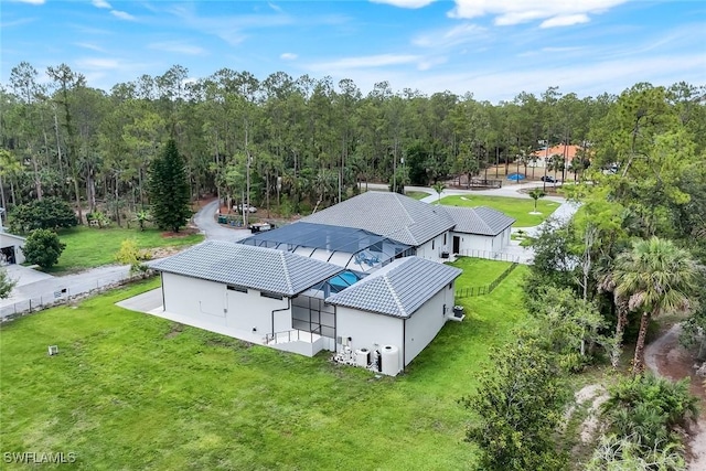 333 12th Ave NE, Naples, FL 34120 - view of subject property featuring a heavily wooded area
