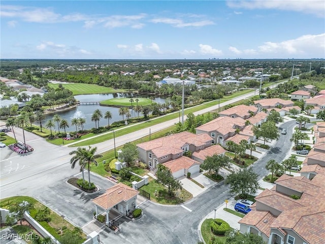aerial perspective of suburban area with a large body of water