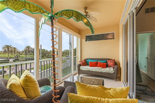 sunroom with a textured wall
