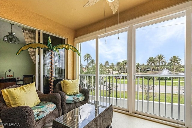 sunroom with a water view