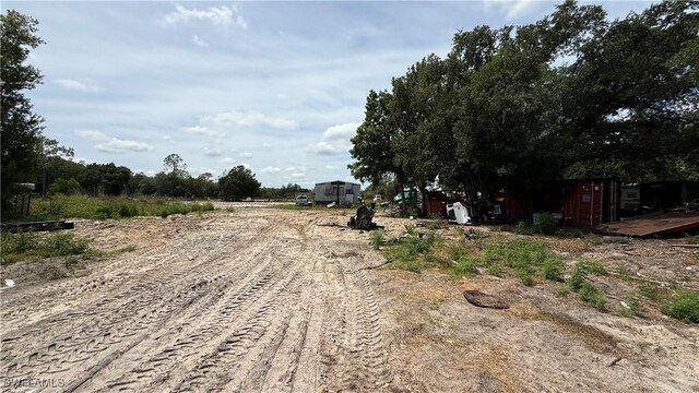 17200 Kentara Way, Fort Myers, FL 33913 - view of dirt / gravel road featuring a view of countryside