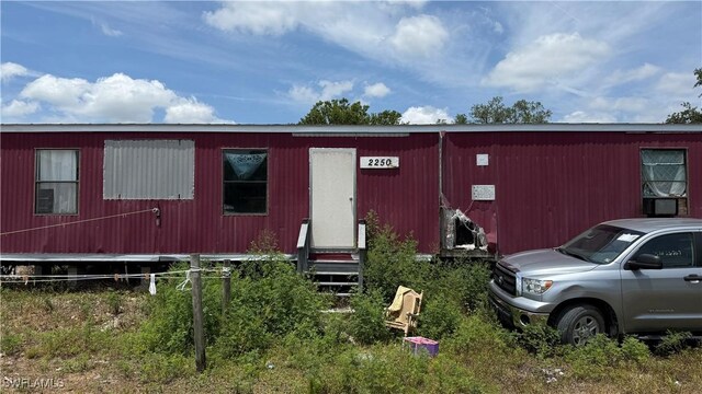 17200 Kentara Way, Fort Myers, FL 33913 - view of front of home featuring a pole building and an outbuilding