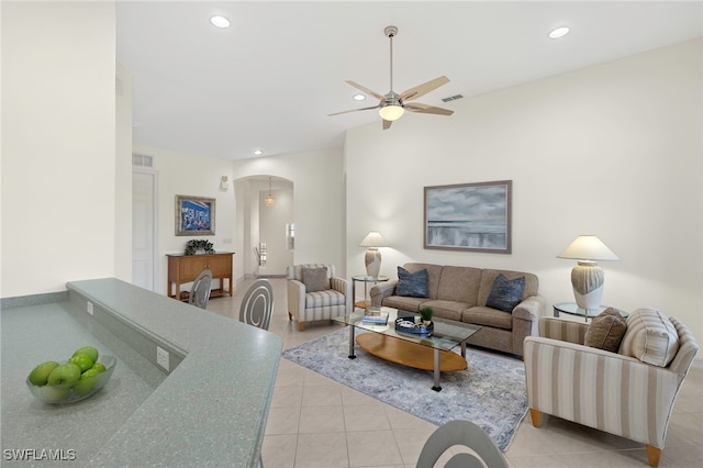 21551 Pelican Sound Dr Unit 202, Estero, FL 33928 - living room with arched walkways, recessed lighting, ceiling fan, and light tile patterned floors
