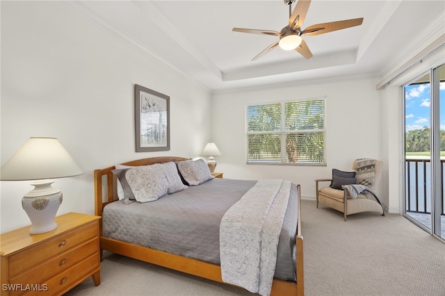 21551 Pelican Sound Dr Unit 202, Estero, FL 33928 - carpeted bedroom featuring access to exterior, a tray ceiling, and ceiling fan