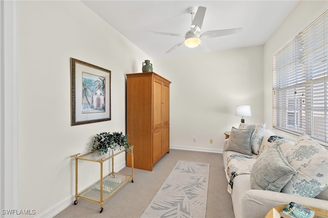 21551 Pelican Sound Dr Unit 202, Estero, FL 33928 - living area with light carpet, baseboards, a ceiling fan, and lofted ceiling