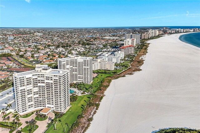 view of urban area with a large body of water