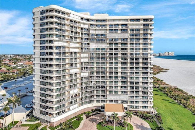 view of apartment building / complex featuring a water view