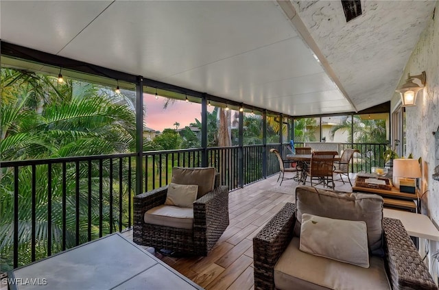 300 Palm Dr Unit 402, Naples, FL 34112 - sunroom / solarium featuring outdoor dining space