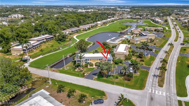 300 Palm Dr Unit 402, Naples, FL 34112 - aerial view of property and surrounding area with a large body of water and nearby suburban area