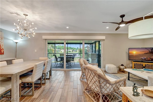 300 Palm Dr Unit 402, Naples, FL 34112 - dining room featuring crown molding, wood finished floors, a chandelier, recessed lighting, and a ceiling fan