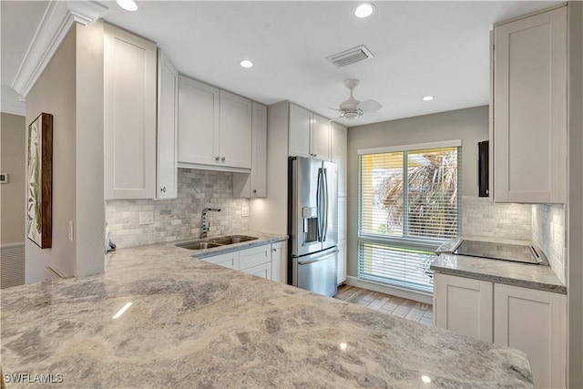 300 Palm Dr Unit 402, Naples, FL 34112 - kitchen with stainless steel fridge with ice dispenser, a sink, tasteful backsplash, a ceiling fan, and recessed lighting
