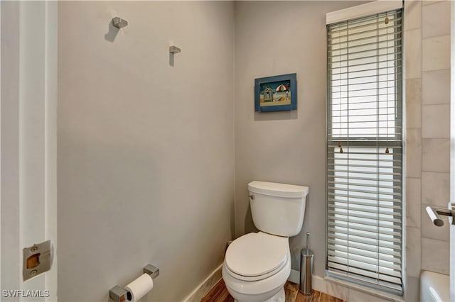 300 Palm Dr Unit 402, Naples, FL 34112 - bathroom with toilet, baseboards, and wood finished floors